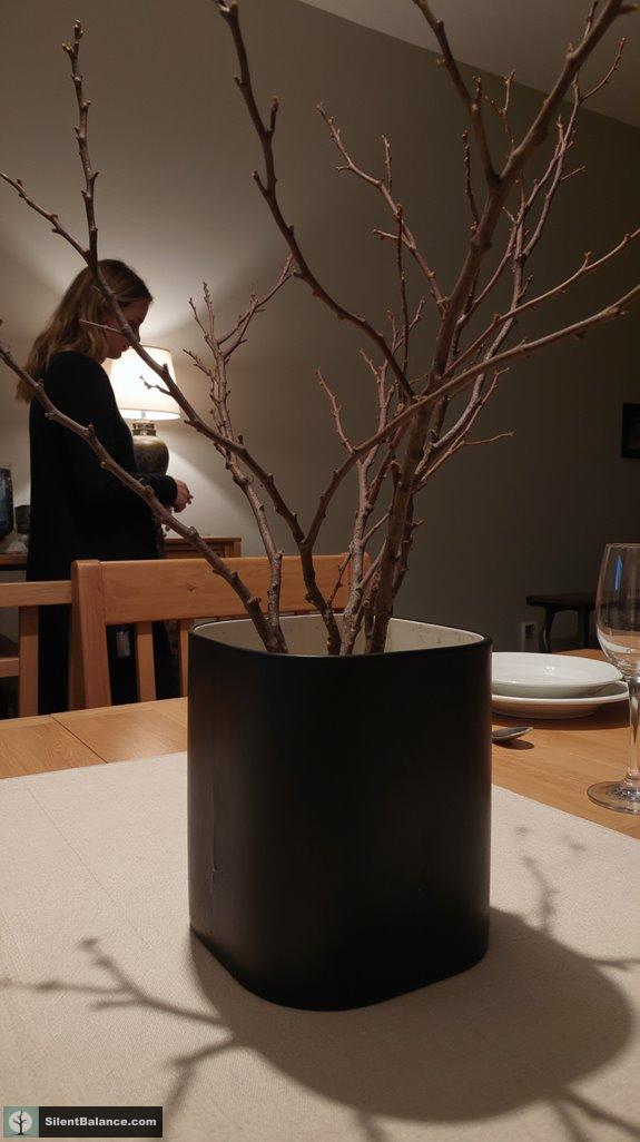 minimalist branch centerpiece arrangements